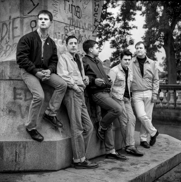 Blackburn's indie rock band 'Bradford' posing on Queen Victoria Statue