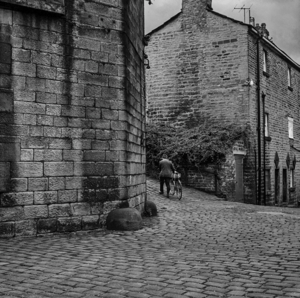 Cyclist, Buildings off Higher Eanham, Near Leeds and Liverpool Canal, Blackburn 