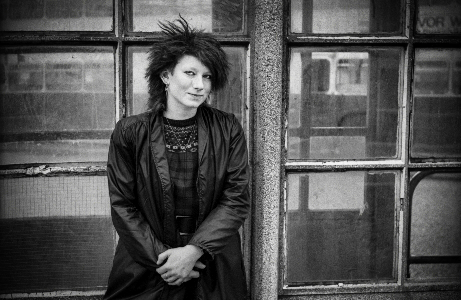 Young woman in front of concrete bus shelter, Boulevard - Blackburn - A Town and its People by Christopher John Ball