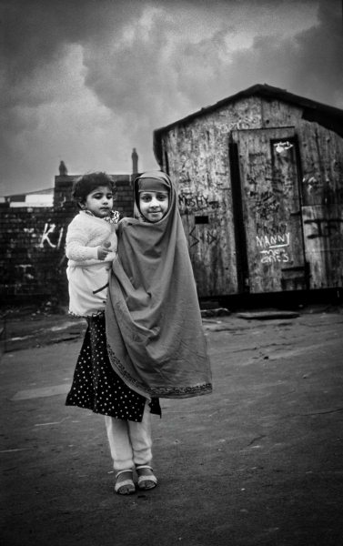 Young girl holding little sister at Brookhouse Community Centre - Blackburn - A Town and its People by Christopher John Ball