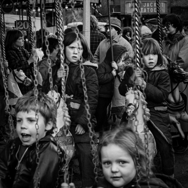 Bored Children on Ride at Blackburn Easter Fair - Blackburn a Town and its People Photographic Study