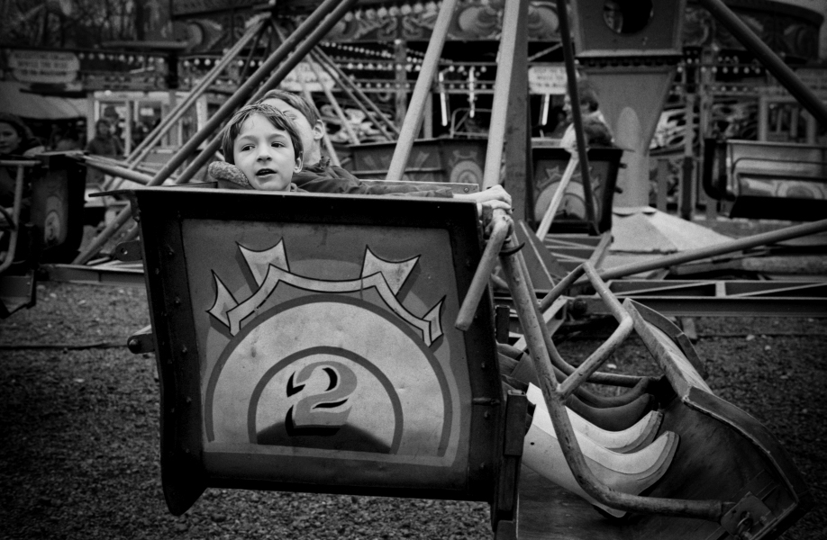 Children Enjoying Ride At The Easter Fair - Blackburn a Town and its People Photographic Study