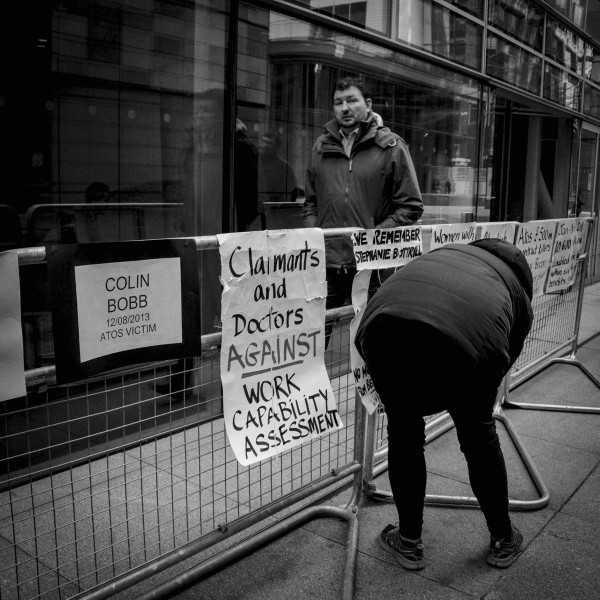 Demonstration by disabled people and carers outside ATOS offices, London 19th February 2014