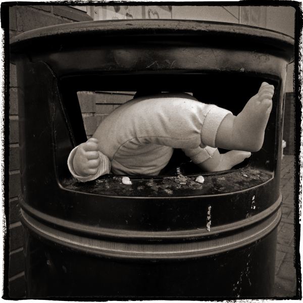 Doll in Bin - Discarded: Photographic Essay by Christopher John Ball - Photographer & Writer