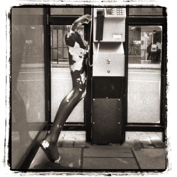 Leg Left in Public Telephone Box from Discarded a Photographic Essay by Christopher John Ball Photographer and writer