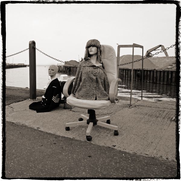 Mannequins on Chair from Discarded a Photographic Essay by Christopher John Ball Photographer and Writer