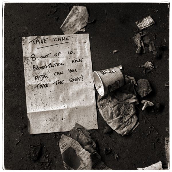 Take Care Note Warning of Prostitutes from Discarded a Photographic Essay by Christopher John Ball
