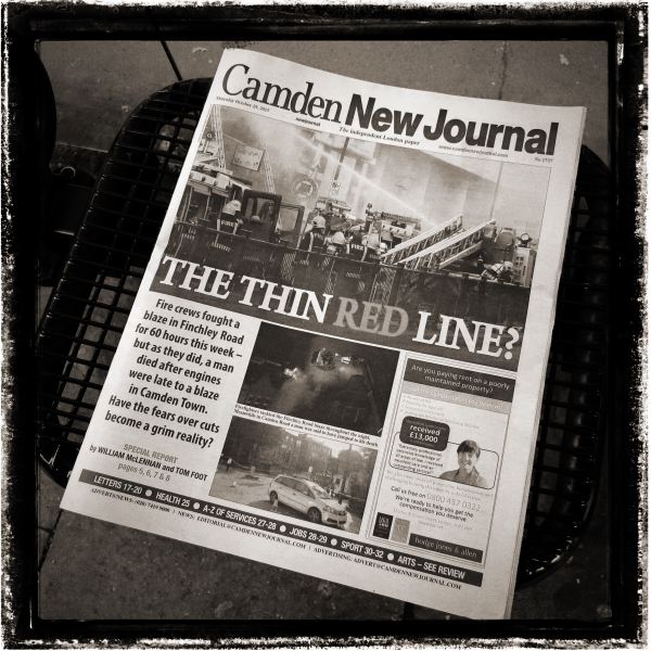 The Thin Red Line newspaper headline on paper left at Bus stop from Discarded a photographic Essay by Christopher John Ball Photographer and Writer