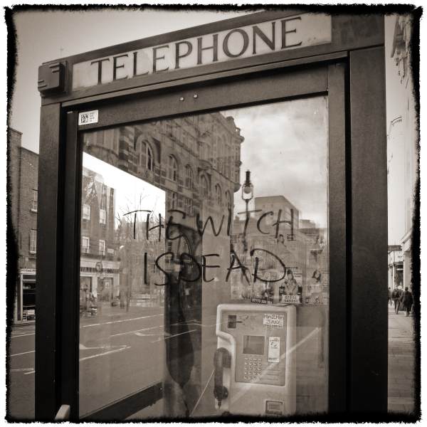 The Witch is Dead on Telephone Box from Discarded a Photographic Essay by Christopher John Ball Photographer and Writer
