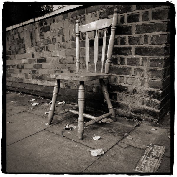 Chair left on Street from Discarded a Photographic Essay by Christopher John Ball Photographer and Writer