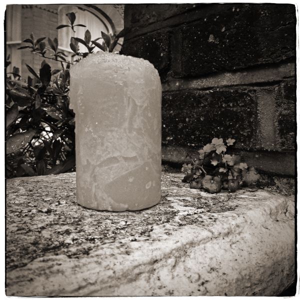 Candle on Wall from Discarded - a photographic essay by Christopher John Ball photographer and writer