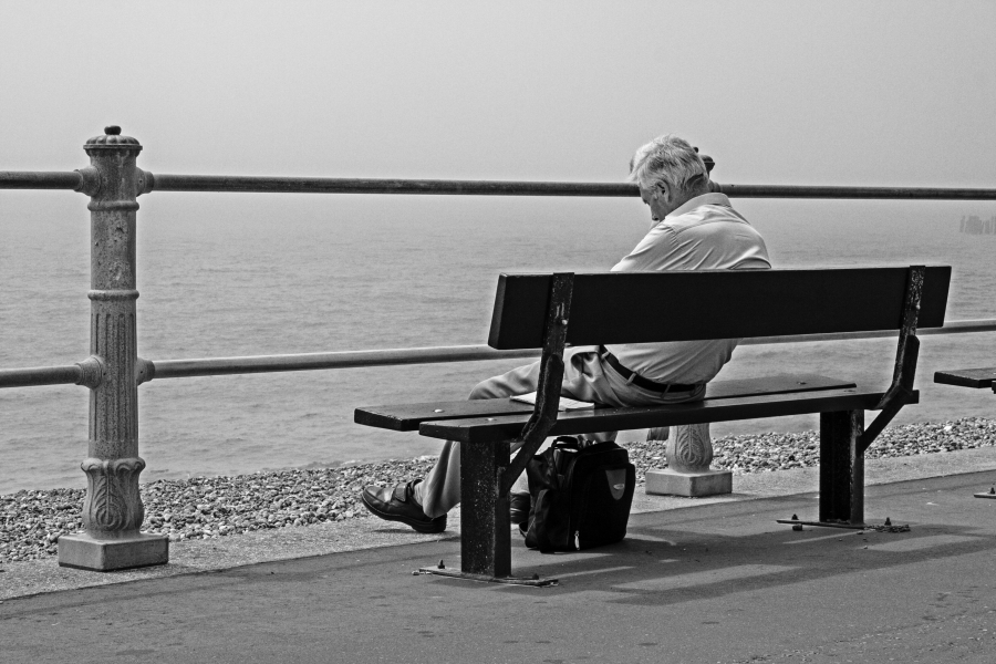 Man resting on promenade bench, Hastings 2007 - Photographic Essay by Christopher John Ball