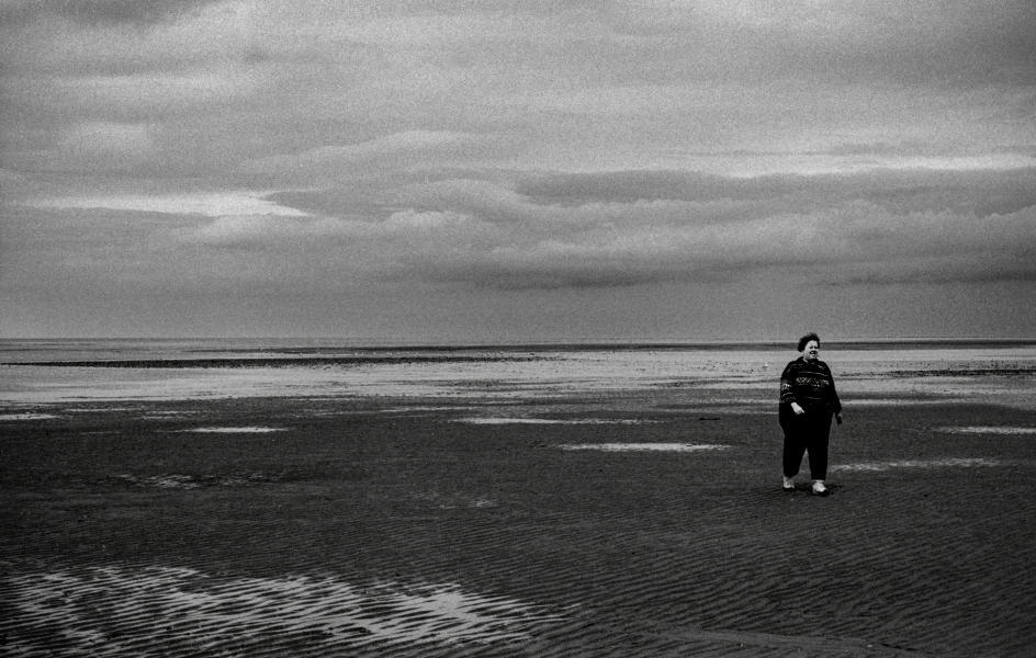 Woman on beach, Llandudno 1992 From British Coastal Resorts - Photographic Essay by Chris Ball