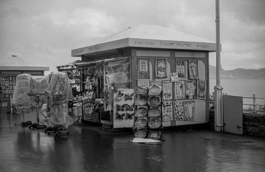 Pier Stall in rain, Llandudno 1992 - From British Coastal Resorts - Photographic Essay by Chris Ball