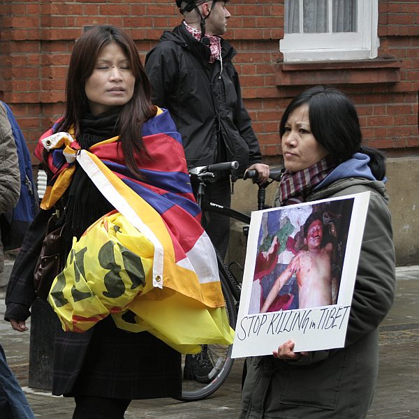 'London - A City and its People' - Olympic Torch Procession with Free Tibet Protest near Russell Square 6th April 2008 - A photographic study by Christopher John Ball - Photographer and Writer